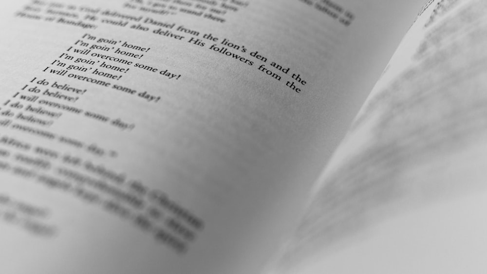 shallow focus photography of book page