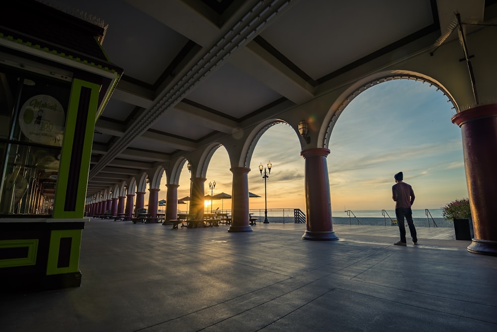 man standing inside building