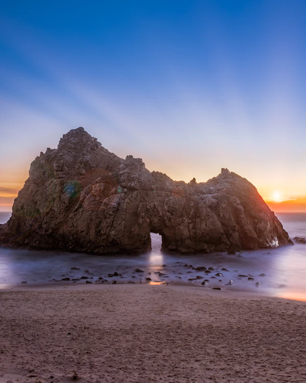 Keyhole Arch at Pfeiffer Beach during sunset