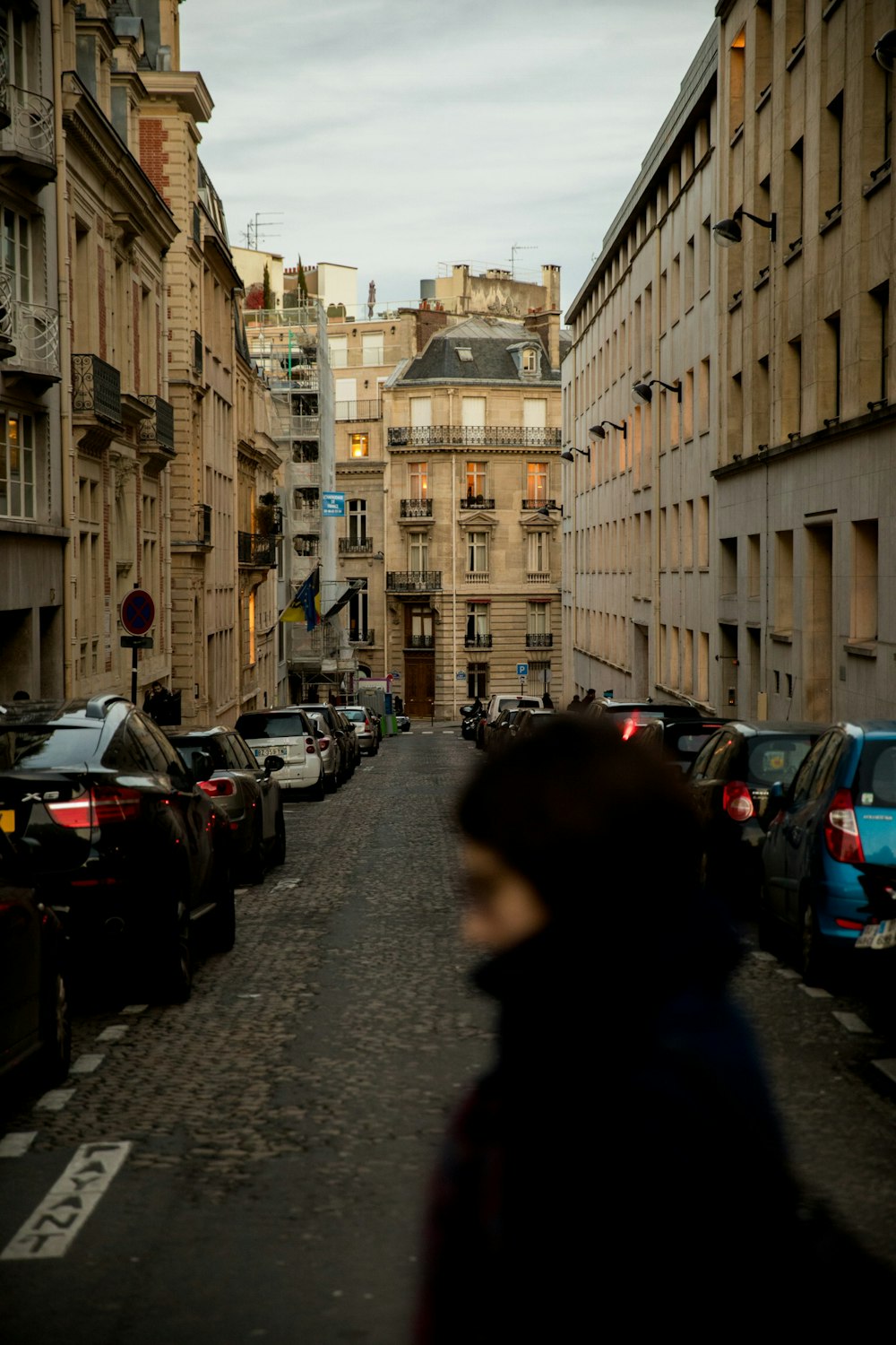 selective focus photography of building near parked car