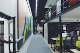 A vibrant office space with colorful walls and engaged employees collaborating, illustrating the gold tier environment.