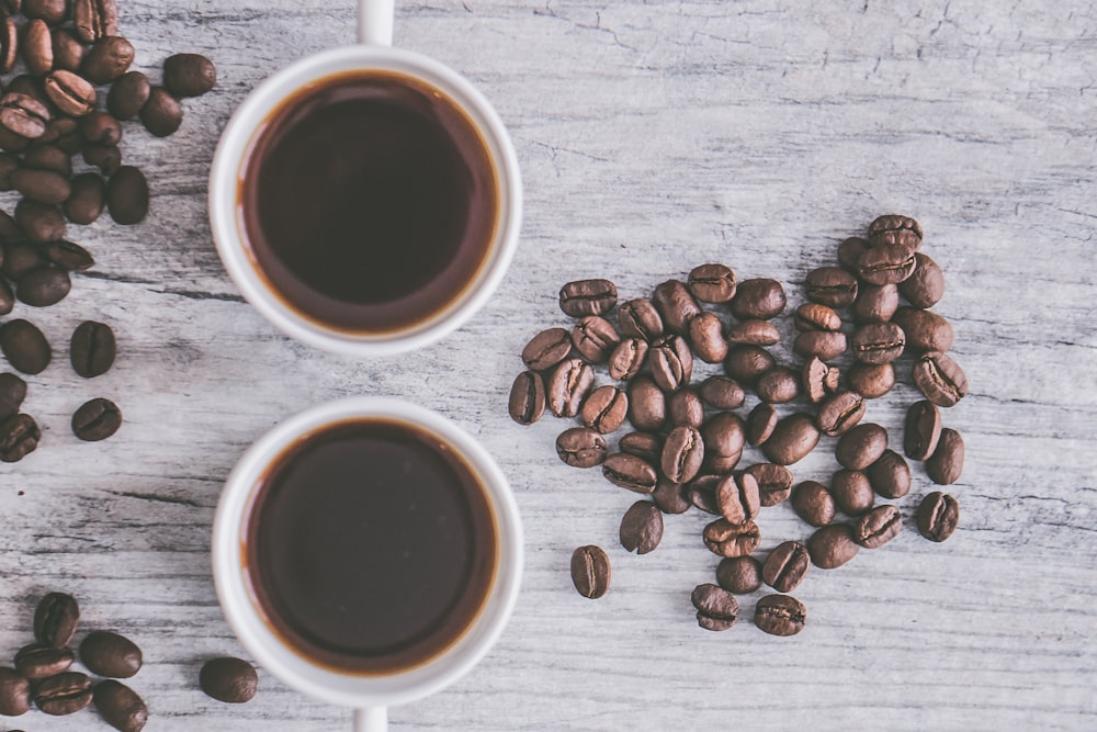 flat lay photo of cup black coffee