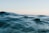 body of water under sky