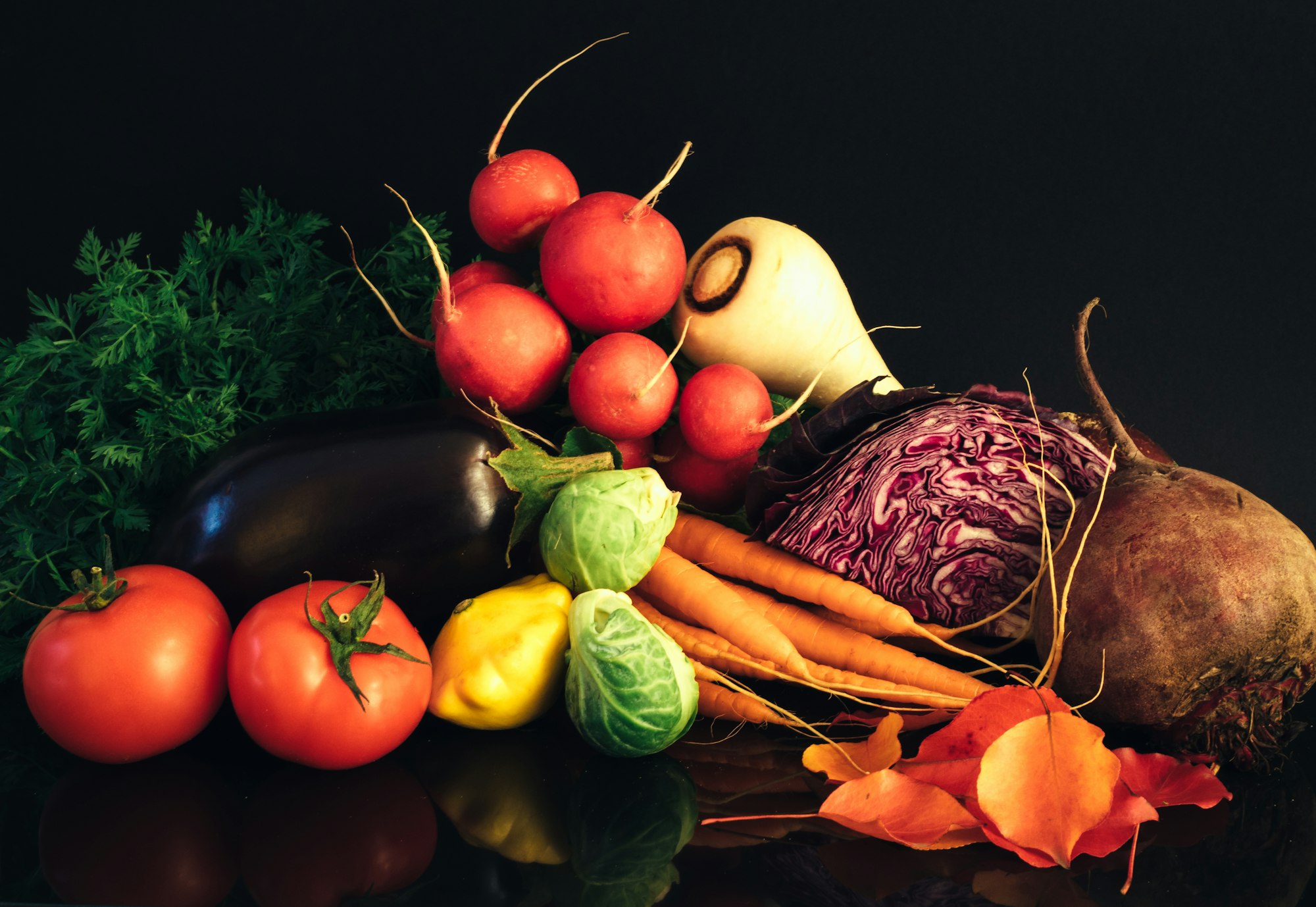 I decided to gather some autumn vegetables, pile them into some sort of pleasing form and see how they looked. The autumn leaves were just for effect!