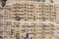 Aerial shot showing the grid layout of lot divisions amidst the vibrant jungle.
