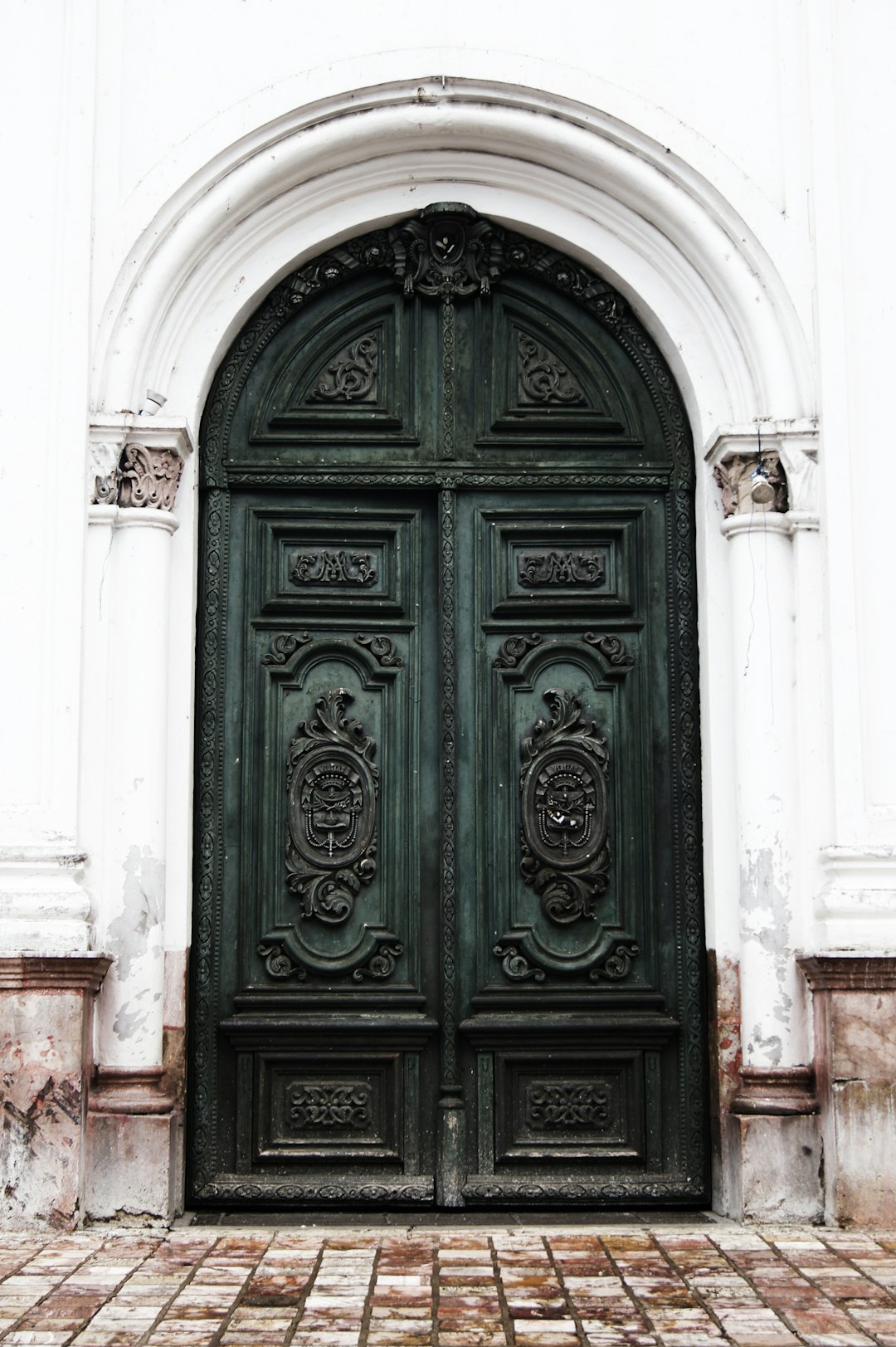  green wooden door door frame