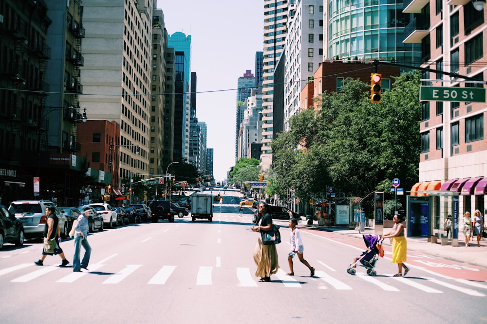 people crossing pedestrian lane