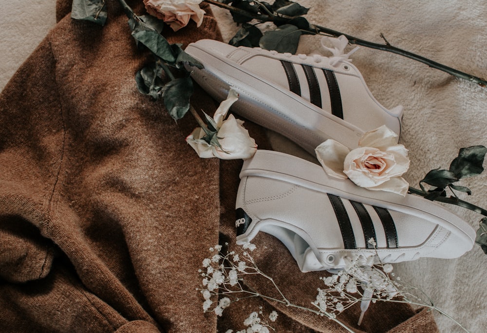 Pair of black and white adidas shoes photo – Free Green Image on Unsplash