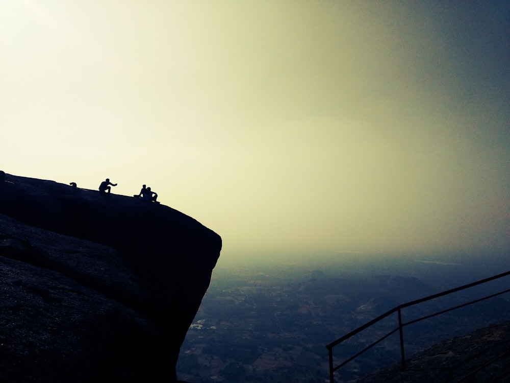 person on top on the mountain