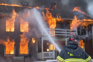 fireman watering fire