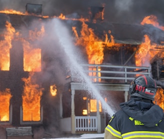 fireman watering fire