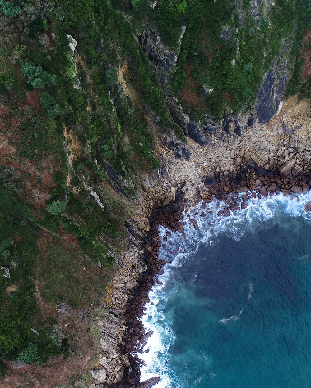 bird's-eye view photography of ocean near island