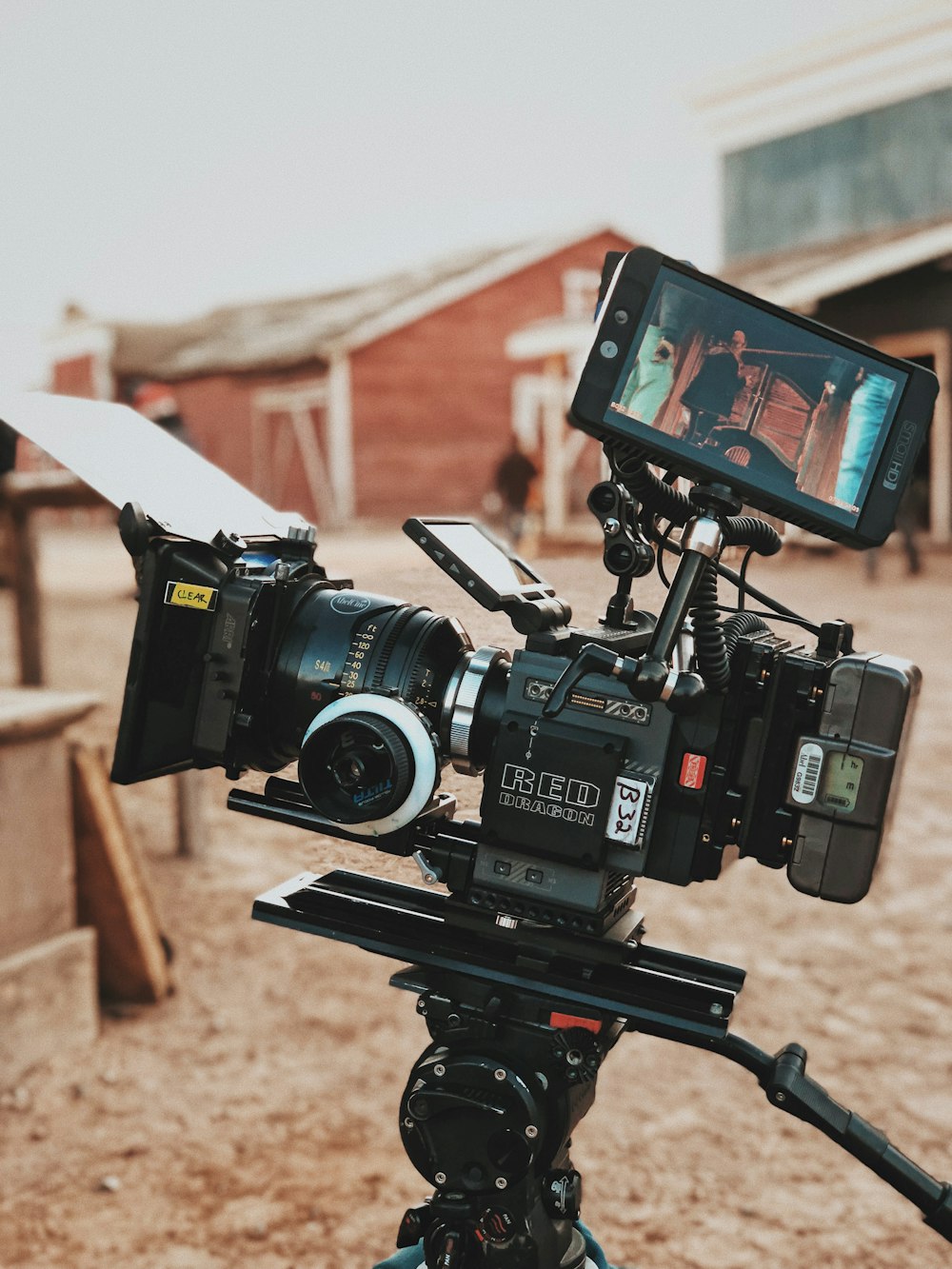 camera filming a brown structure