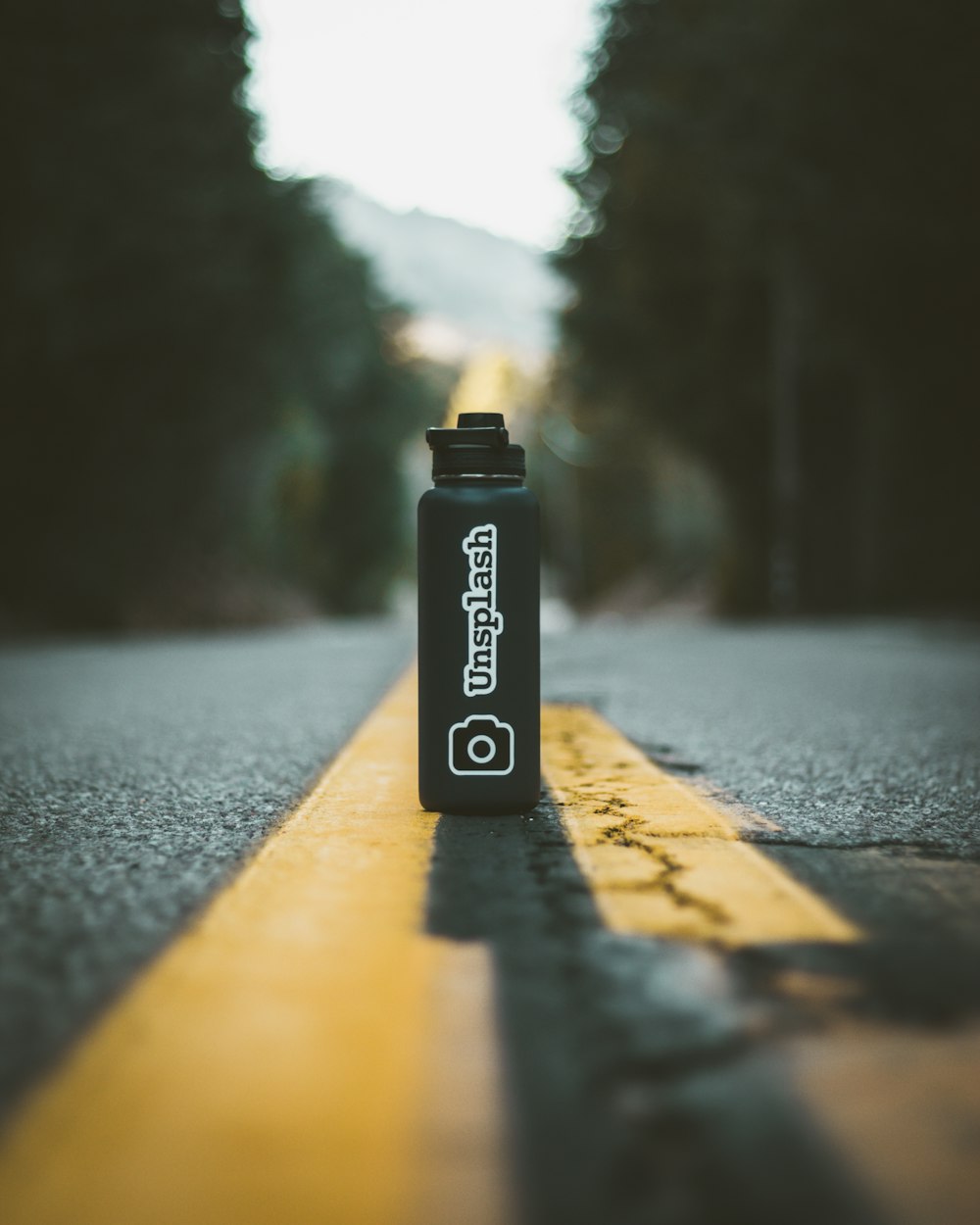 Tilt-Shift-Fotografie der Unsplash-Flasche