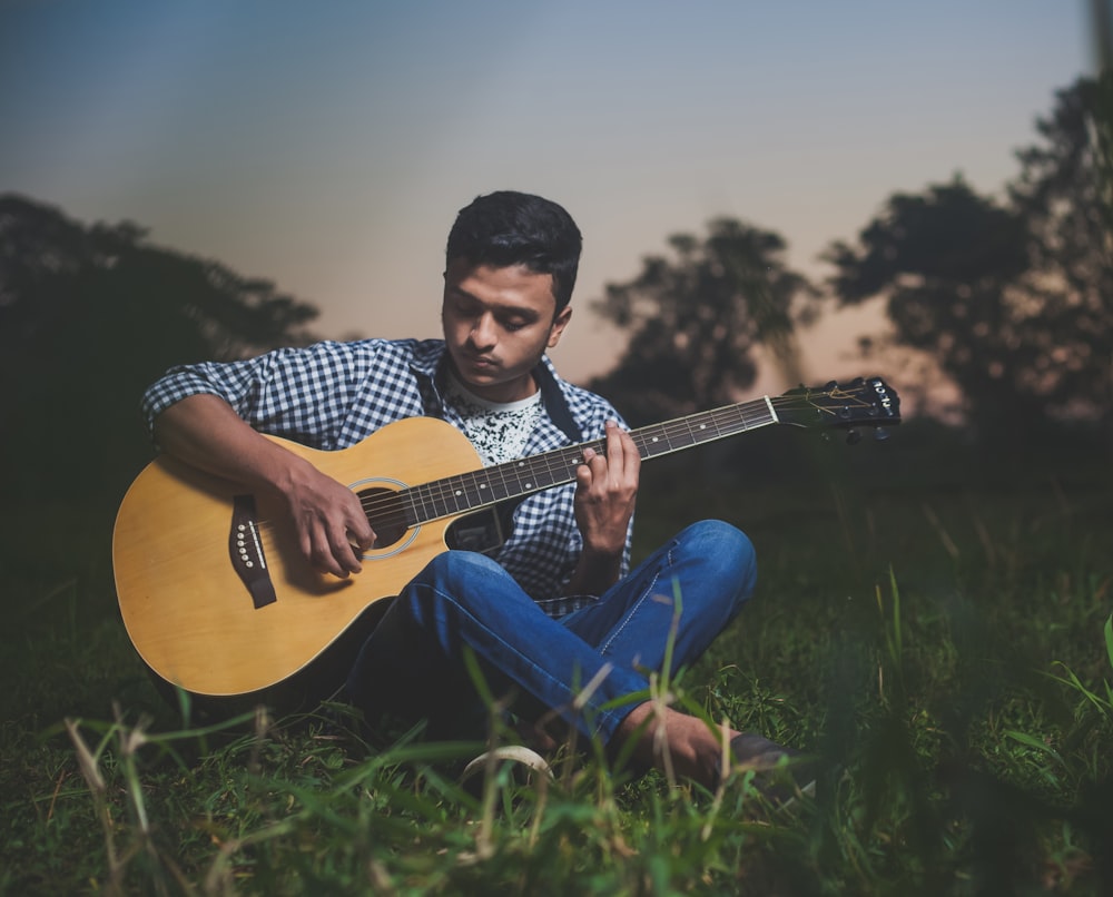 man playing guitar