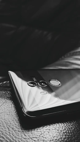 Close-up of a Cross Foot Android phone highlighting its ergonomic design and smooth finish.