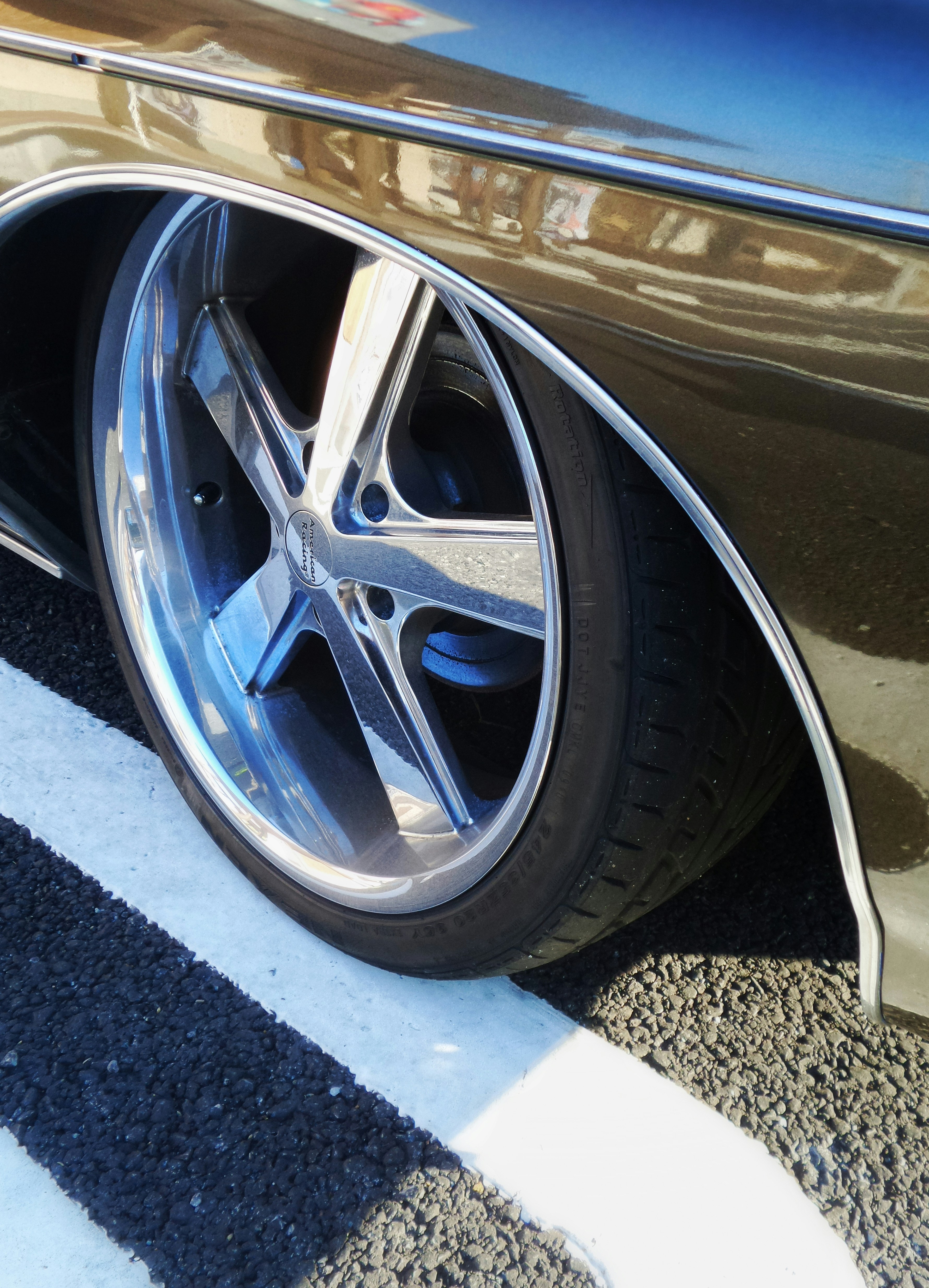 Chrome Vehicle Wheel With Black Tire Photo Free Tire Image On Unsplash