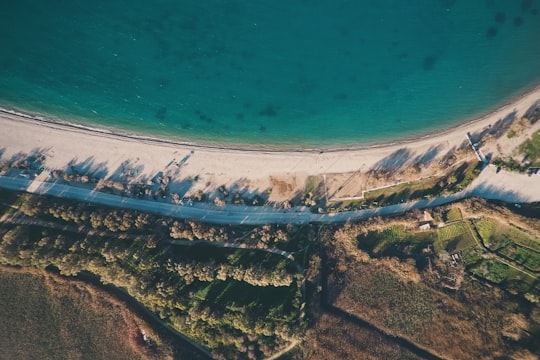 aerial photography of sea and green trees in Patras Greece