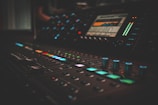 close-up photography of turned on audio mixer