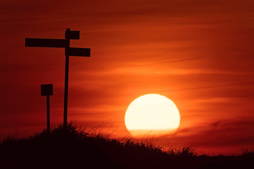 silhouette of black post during sunset