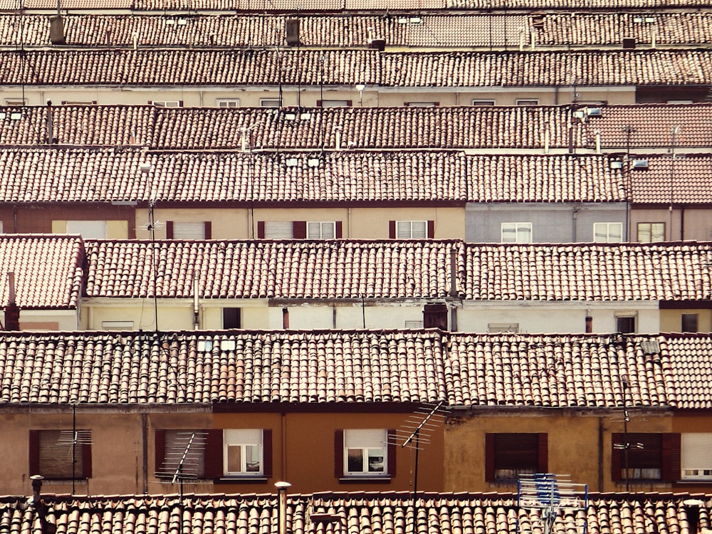 bird's-eye view photography of houses with brown shingles