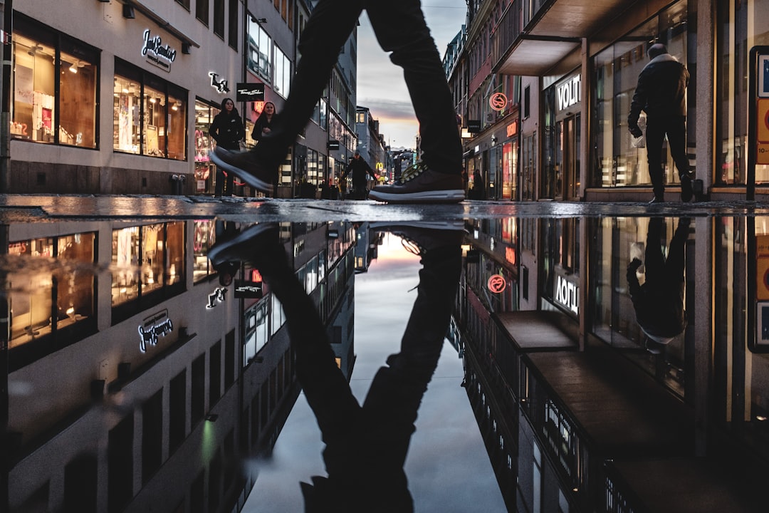 person reflecting on ground water, www.jonasjacobsson.co