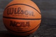 Wilson NCAA basketball on black board