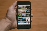 person holding black Android smartphone