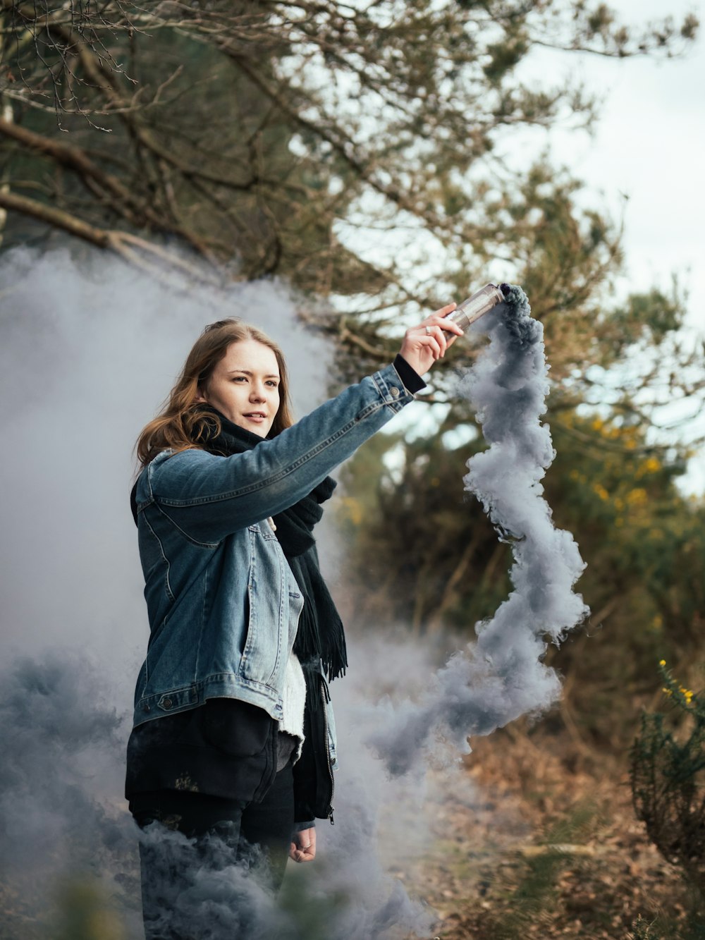 woman holding smoking device