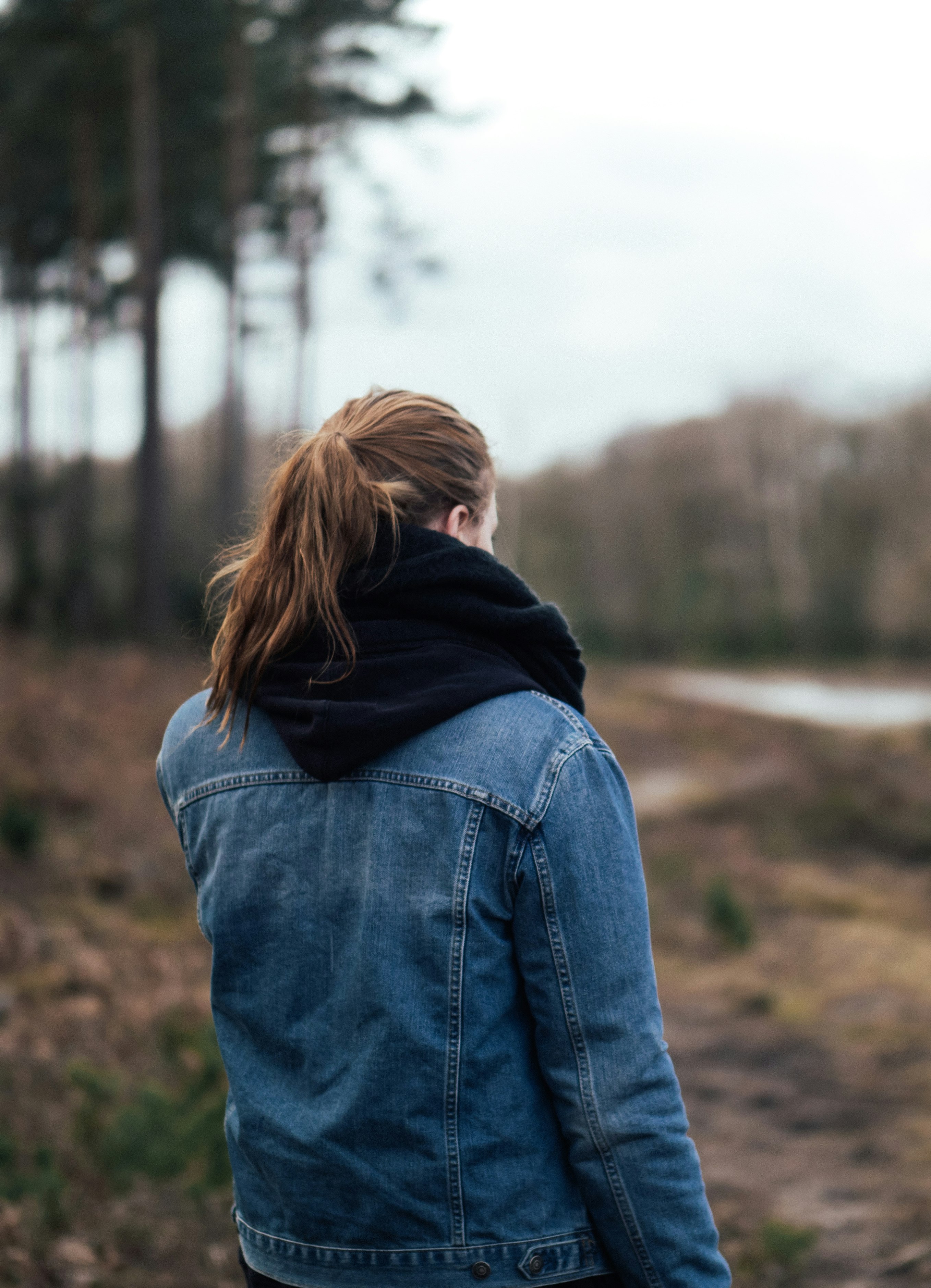 woman in blue denim jacket