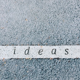 ideas carved on concrete surface