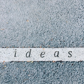 ideas carved on concrete surface