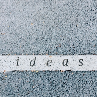 ideas carved on concrete surface
