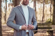 person holding gray coat