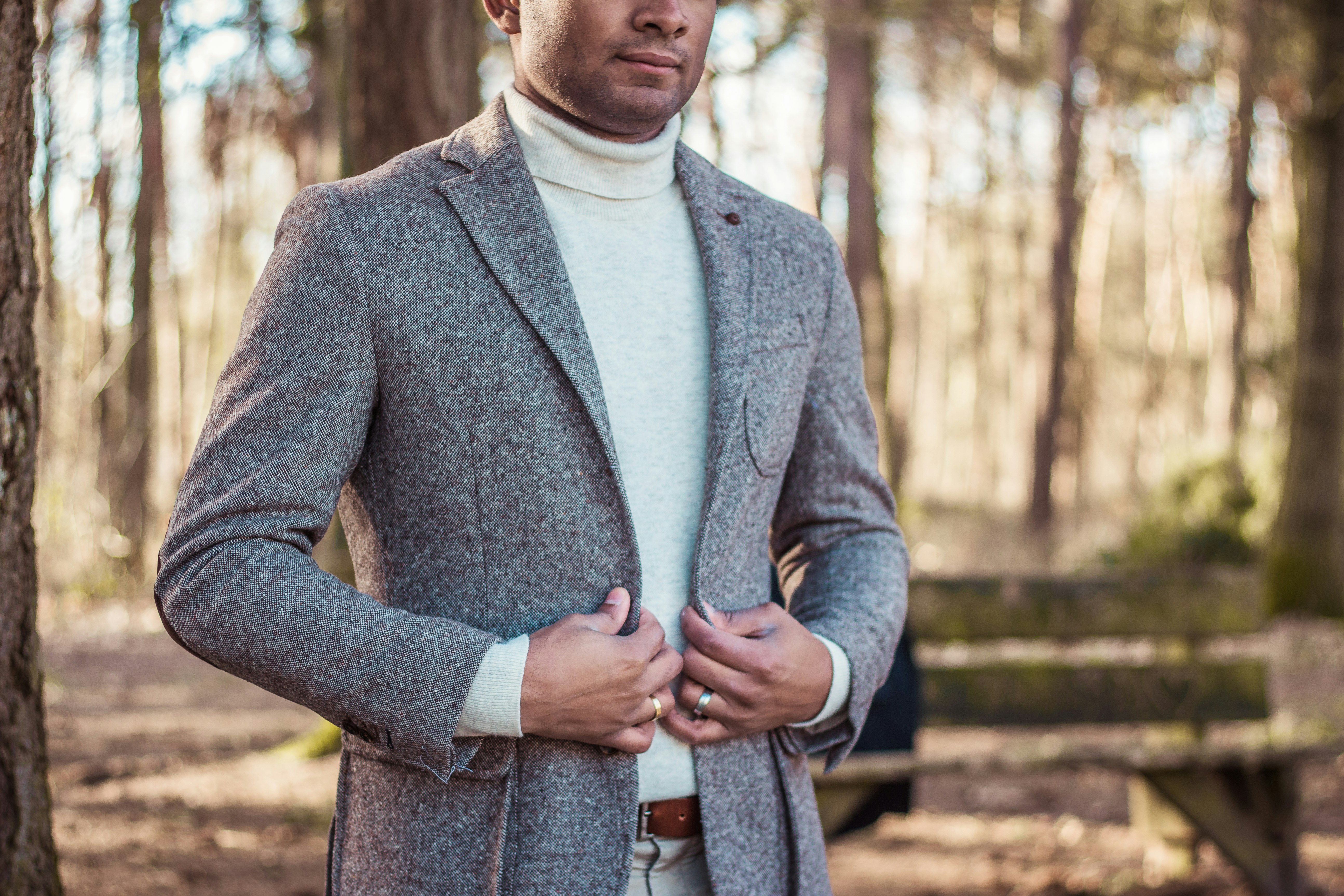 person holding gray coat