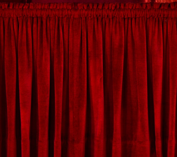 closeup photo of red rod pocket curtain