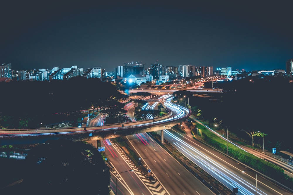 time lapse photo of concrete highway with cars