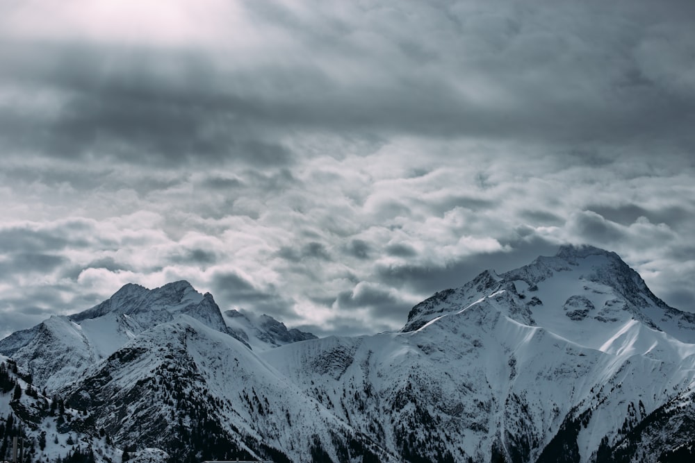 photo of snow coated mountain