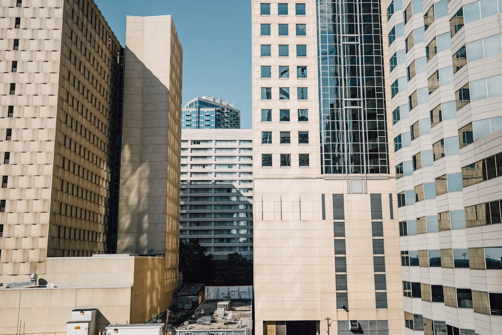 photo of white buildings during daytime