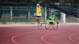 man using green wheelchair for walking