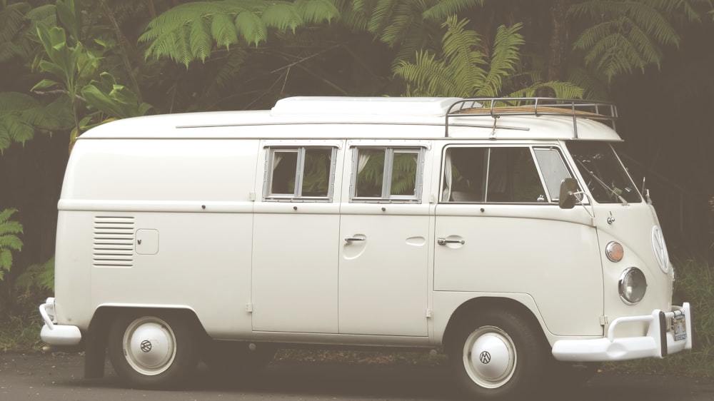 white Volkswagen van in focus photography