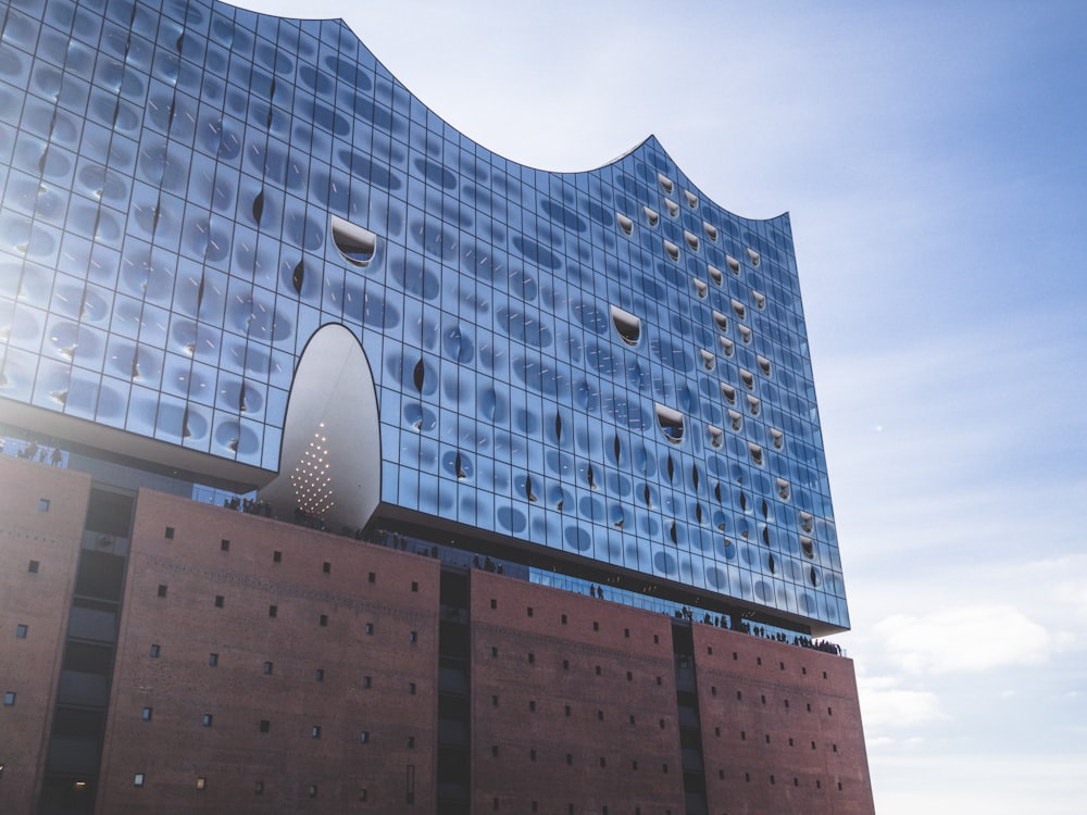 white and blue concrete building under blue sky during daytime