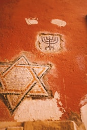 a picture of a star of david on a wall