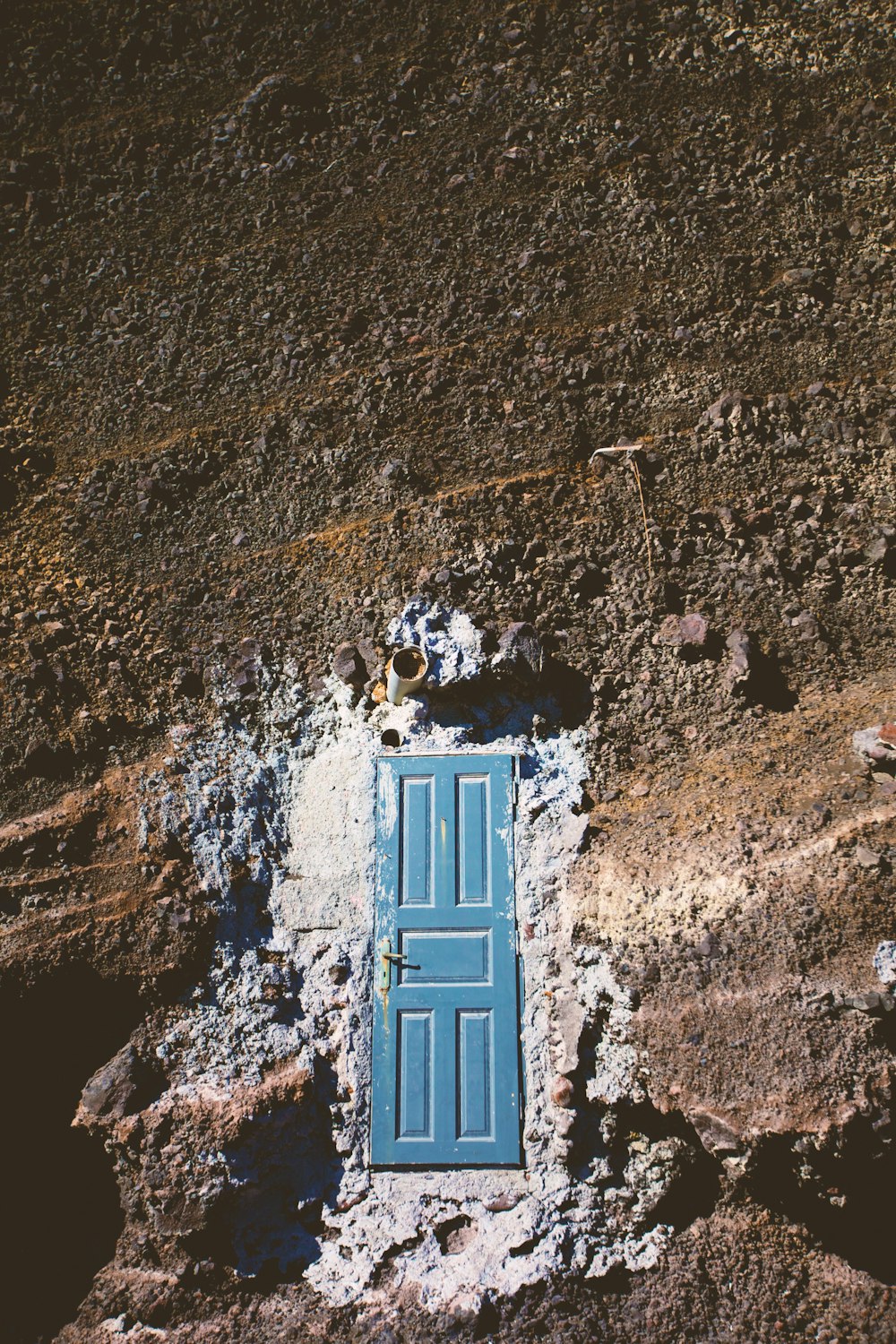 blue wooden 5-panel door