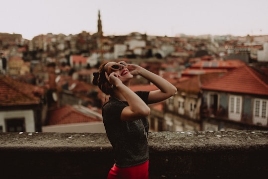 shallow focus photography of woman staring on sky in Porto Portugal