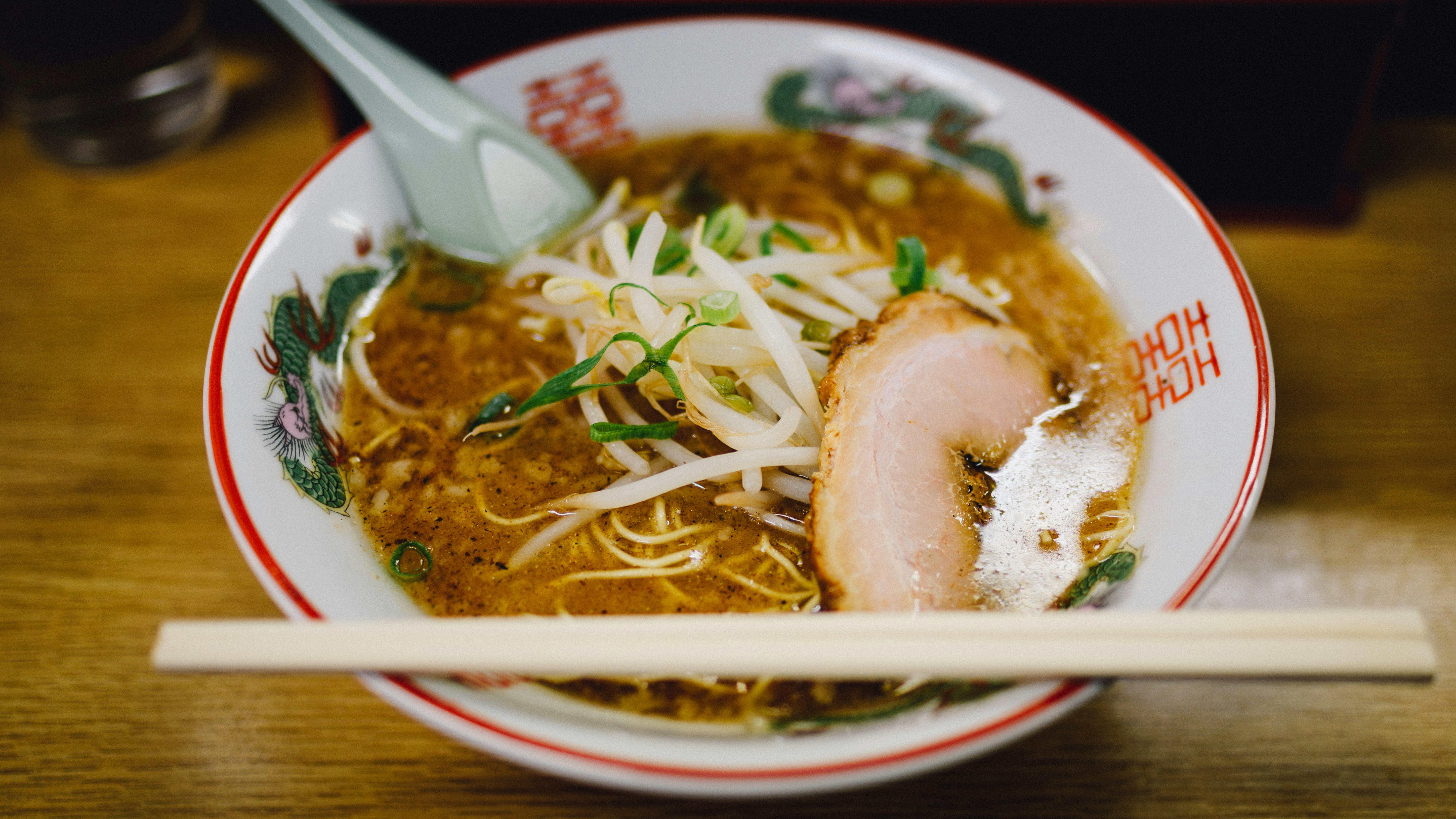 noodles topped with beef in bowl