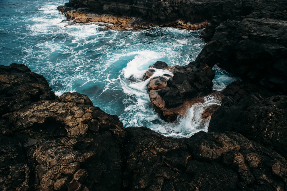 bird's eye body of water and rock formation