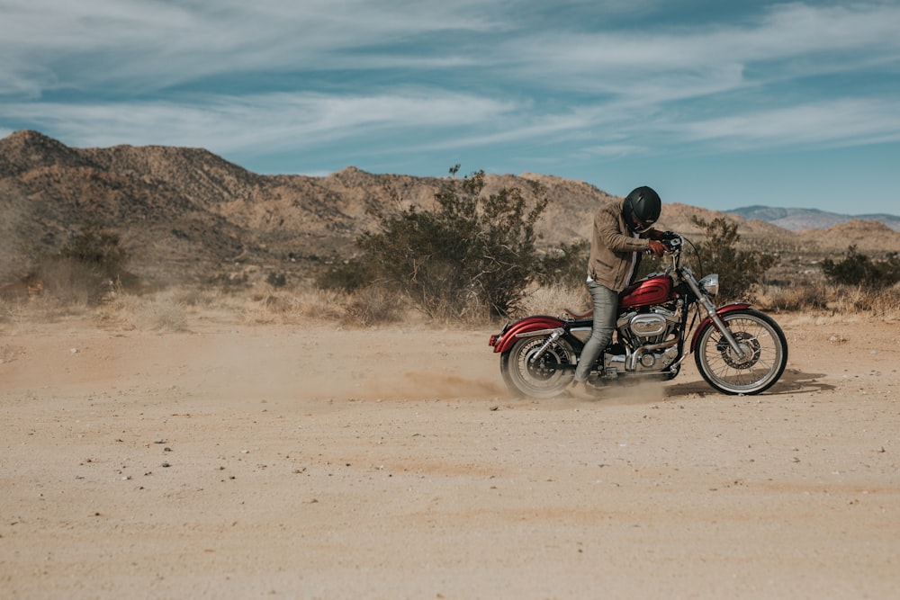 man riding cruiser motorcycle