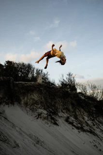 Close-up of the main character performing an acrobatic flip mid-air in Jesus Run.