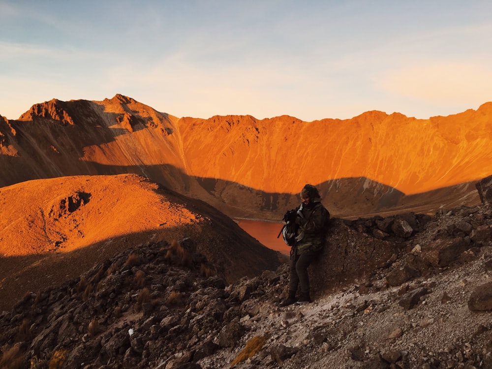 person standing on canyon during daytime